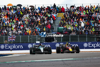 2024-07-07 - 63 RUSSELL George (gbr), Mercedes AMG F1 Team W15, 11 PEREZ Sergio (mex), Red Bull Racing RB20, action during the Formula 1 Qatar Airways British Grand Prix 2024, 12th round of the 2024 Formula One World Championship from July 5 to 7, 2024 on the Silverstone Circuit, in Silverstone, United Kingdom - F1 - BRITISH GRAND PRIX 2024 - FORMULA 1 - MOTORS