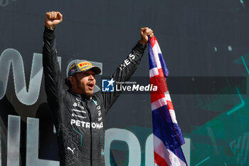 2024-07-07 - HAMILTON Lewis (gbr), Mercedes AMG F1 Team W15, portrait celebration podium during the Formula 1 Qatar Airways British Grand Prix 2024, 12th round of the 2024 Formula One World Championship from July 5 to 7, 2024 on the Silverstone Circuit, in Silverstone, United Kingdom - F1 - BRITISH GRAND PRIX 2024 - FORMULA 1 - MOTORS