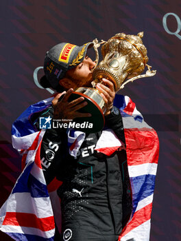 2024-07-07 - HAMILTON Lewis (gbr), Mercedes AMG F1 Team W15, portrait celebration podium trophy during the Formula 1 Qatar Airways British Grand Prix 2024, 12th round of the 2024 Formula One World Championship from July 5 to 7, 2024 on the Silverstone Circuit, in Silverstone, United Kingdom - F1 - BRITISH GRAND PRIX 2024 - FORMULA 1 - MOTORS