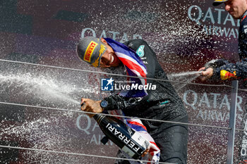 2024-07-07 - HAMILTON Lewis (gbr), Mercedes AMG F1 Team W15, portrait celebration podium Ferrari champagne during the Formula 1 Qatar Airways British Grand Prix 2024, 12th round of the 2024 Formula One World Championship from July 5 to 7, 2024 on the Silverstone Circuit, in Silverstone, United Kingdom - F1 - BRITISH GRAND PRIX 2024 - FORMULA 1 - MOTORS