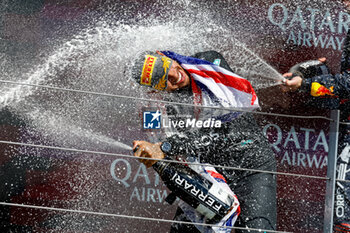 2024-07-07 - HAMILTON Lewis (gbr), Mercedes AMG F1 Team W15, portrait celebration podium Ferrari champagne during the Formula 1 Qatar Airways British Grand Prix 2024, 12th round of the 2024 Formula One World Championship from July 5 to 7, 2024 on the Silverstone Circuit, in Silverstone, United Kingdom - F1 - BRITISH GRAND PRIX 2024 - FORMULA 1 - MOTORS