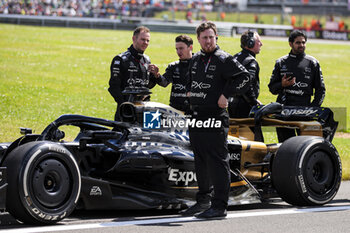 2024-07-07 - APX GP Team crew filming in the paddock for the Apex F1 movie by Apple Studios / Bruckheimer Films during the Formula 1 Qatar Airways British Grand Prix 2024, 12th round of the 2024 Formula One World Championship from July 5 to 7, 2024 on the Silverstone Circuit, in Silverstone, United Kingdom - F1 - BRITISH GRAND PRIX 2024 - FORMULA 1 - MOTORS