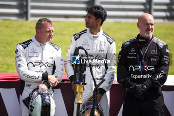 2024-07-07 - APX GP Team crew filming in the paddock for the Apex F1 movie by Apple Studios / Bruckheimer Films during the Formula 1 Qatar Airways British Grand Prix 2024, 12th round of the 2024 Formula One World Championship from July 5 to 7, 2024 on the Silverstone Circuit, in Silverstone, United Kingdom - F1 - BRITISH GRAND PRIX 2024 - FORMULA 1 - MOTORS