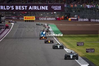 2024-07-07 - 63 RUSSELL George (gbr), Mercedes AMG F1 Team W15, action leads the group during the Formula 1 Qatar Airways British Grand Prix 2024, 12th round of the 2024 Formula One World Championship from July 5 to 7, 2024 on the Silverstone Circuit, in Silverstone, United Kingdom - F1 - BRITISH GRAND PRIX 2024 - FORMULA 1 - MOTORS