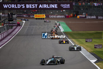 2024-07-07 - 63 RUSSELL George (gbr), Mercedes AMG F1 Team W15, action leads the group during the Formula 1 Qatar Airways British Grand Prix 2024, 12th round of the 2024 Formula One World Championship from July 5 to 7, 2024 on the Silverstone Circuit, in Silverstone, United Kingdom - F1 - BRITISH GRAND PRIX 2024 - FORMULA 1 - MOTORS