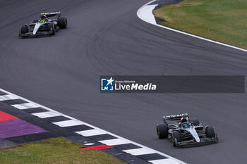 2024-07-07 - 63 RUSSELL George (gbr), Mercedes AMG F1 Team W15, action and 44 HAMILTON Lewis (gbr), Mercedes AMG F1 Team W15, action during the Formula 1 Qatar Airways British Grand Prix 2024, 12th round of the 2024 Formula One World Championship from July 5 to 7, 2024 on the Silverstone Circuit, in Silverstone, United Kingdom - F1 - BRITISH GRAND PRIX 2024 - FORMULA 1 - MOTORS