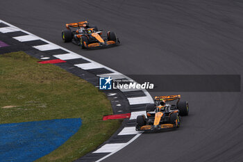 2024-07-07 - 04 NORRIS Lando (gbr), McLaren F1 Team MCL38, action and 81 PIASTRI Oscar (aus), McLaren F1 Team MCL38, action during the Formula 1 Qatar Airways British Grand Prix 2024, 12th round of the 2024 Formula One World Championship from July 5 to 7, 2024 on the Silverstone Circuit, in Silverstone, United Kingdom - F1 - BRITISH GRAND PRIX 2024 - FORMULA 1 - MOTORS