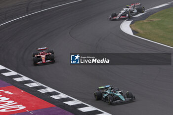 2024-07-07 - 18 STROLL Lance (can), Aston Martin F1 Team AMR24, action, 16 LECLERC Charles (mco), Scuderia Ferrari SF-24, action and 27 HULKENBERG Nico (ger), Haas F1 Team VF-24 Ferrari, action during the Formula 1 Qatar Airways British Grand Prix 2024, 12th round of the 2024 Formula One World Championship from July 5 to 7, 2024 on the Silverstone Circuit, in Silverstone, United Kingdom - F1 - BRITISH GRAND PRIX 2024 - FORMULA 1 - MOTORS