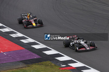 2024-07-07 - 20 MAGNUSSEN Kevin (den), Haas F1 Team VF-24 Ferrari, action 11 PEREZ Sergio (mex), Red Bull Racing RB20, action during the Formula 1 Qatar Airways British Grand Prix 2024, 12th round of the 2024 Formula One World Championship from July 5 to 7, 2024 on the Silverstone Circuit, in Silverstone, United Kingdom - F1 - BRITISH GRAND PRIX 2024 - FORMULA 1 - MOTORS