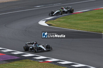 2024-07-07 - 63 RUSSELL George (gbr), Mercedes AMG F1 Team W15, action and 44 HAMILTON Lewis (gbr), Mercedes AMG F1 Team W15, action during the Formula 1 Qatar Airways British Grand Prix 2024, 12th round of the 2024 Formula One World Championship from July 5 to 7, 2024 on the Silverstone Circuit, in Silverstone, United Kingdom - F1 - BRITISH GRAND PRIX 2024 - FORMULA 1 - MOTORS