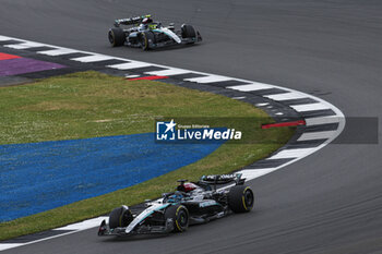 2024-07-07 - 63 RUSSELL George (gbr), Mercedes AMG F1 Team W15, action and 44 HAMILTON Lewis (gbr), Mercedes AMG F1 Team W15, action during the Formula 1 Qatar Airways British Grand Prix 2024, 12th round of the 2024 Formula One World Championship from July 5 to 7, 2024 on the Silverstone Circuit, in Silverstone, United Kingdom - F1 - BRITISH GRAND PRIX 2024 - FORMULA 1 - MOTORS