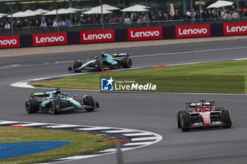 2024-07-07 - 16 LECLERC Charles (mco), Scuderia Ferrari SF-24, action, 18 STROLL Lance (can), Aston Martin F1 Team AMR24, action during the Formula 1 Qatar Airways British Grand Prix 2024, 12th round of the 2024 Formula One World Championship from July 5 to 7, 2024 on the Silverstone Circuit, in Silverstone, United Kingdom - F1 - BRITISH GRAND PRIX 2024 - FORMULA 1 - MOTORS