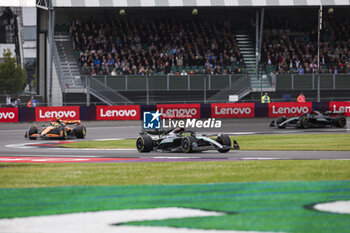 2024-07-07 - 44 HAMILTON Lewis (gbr), Mercedes AMG F1 Team W15, action, 04 NORRIS Lando (gbr), McLaren F1 Team MCL38, action and 63 RUSSELL George (gbr), Mercedes AMG F1 Team W15, action during the Formula 1 Qatar Airways British Grand Prix 2024, 12th round of the 2024 Formula One World Championship from July 5 to 7, 2024 on the Silverstone Circuit, in Silverstone, United Kingdom - F1 - BRITISH GRAND PRIX 2024 - FORMULA 1 - MOTORS