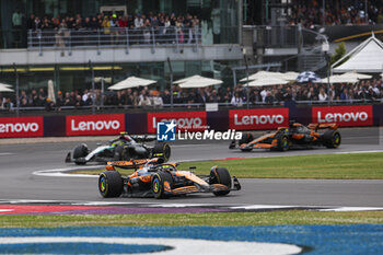 2024-07-07 - 04 NORRIS Lando (gbr), McLaren F1 Team MCL38, action, 44 HAMILTON Lewis (gbr), Mercedes AMG F1 Team W15, action 81 PIASTRI Oscar (aus), McLaren F1 Team MCL38, action during the Formula 1 Qatar Airways British Grand Prix 2024, 12th round of the 2024 Formula One World Championship from July 5 to 7, 2024 on the Silverstone Circuit, in Silverstone, United Kingdom - F1 - BRITISH GRAND PRIX 2024 - FORMULA 1 - MOTORS