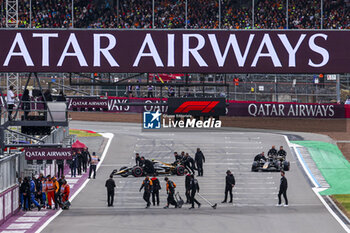 2024-07-07 - APX GP Team crew filming in the paddock for the Apex F1 movie by Apple Studios / Bruckheimer Films during the Formula 1 Qatar Airways British Grand Prix 2024, 12th round of the 2024 Formula One World Championship from July 5 to 7, 2024 on the Silverstone Circuit, in Silverstone, United Kingdom - F1 - BRITISH GRAND PRIX 2024 - FORMULA 1 - MOTORS