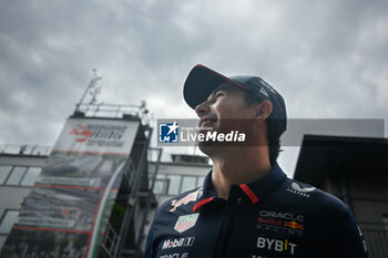 2024-07-21 - #11 Sergio Perez Of The Team Oracle Red Bull Racing, Red Bull Honda RB20 ,In Paddock ,During Fia Formula One World Championship F1 Hungarian Grand Prix 2024, 21 July In Budapest, Hungarian - FORMULA 1 HUNGARIAN GRAND PRIX 2024 - RACE - FORMULA 1 - MOTORS