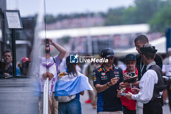 2024-07-21 - #11 Sergio Perez Of The Team Oracle Red Bull Racing, Red Bull Honda RB20 ,In Paddock ,During Fia Formula One World Championship F1 Hungarian Grand Prix 2024, 21 July In Budapest, Hungarian - FORMULA 1 HUNGARIAN GRAND PRIX 2024 - RACE - FORMULA 1 - MOTORS