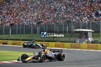 2024-07-21 - #1 Max Verstappen Of The Team Oracle Red Bull Racing, Red Bull Honda RB20 ,Face The Race ,During Fia Formula One World Championship F1 Hungarian Grand Prix 2024, 20 July In Budapest, Hungarian - FORMULA 1 HUNGARIAN GRAND PRIX 2024 - RACE - FORMULA 1 - MOTORS