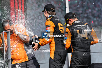 2024-07-21 - #81 Oscar Piastri And #4 Lando Norris Of The Team Mclaren Formula 1 Team, Mclaren Mercedes MCL38Of ,Celebrating The Final Podium ,During Fia Formula One World Championship F1 Hungarian Grand Prix 2024, 20 July In Budapest, Hungarian - FORMULA 1 HUNGARIAN GRAND PRIX 2024 - RACE - FORMULA 1 - MOTORS