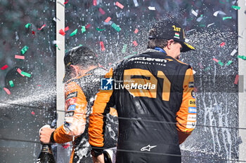 2024-07-21 - #81 Oscar Piastri And #4 Lando Norris Of The Team Mclaren Formula 1 Team, Mclaren Mercedes MCL38Of ,Celebrating The Final Podium ,During Fia Formula One World Championship F1 Hungarian Grand Prix 2024, 20 July In Budapest, Hungarian - FORMULA 1 HUNGARIAN GRAND PRIX 2024 - RACE - FORMULA 1 - MOTORS