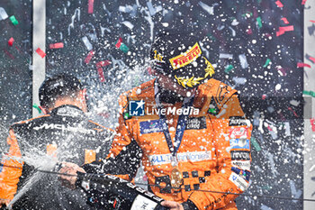 2024-07-21 - #81 Oscar Piastri And #4 Lando Norris Of The Team Mclaren Formula 1 Team, Mclaren Mercedes MCL38Of ,Celebrating The Final Podium ,During Fia Formula One World Championship F1 Hungarian Grand Prix 2024, 20 July In Budapest, Hungarian - FORMULA 1 HUNGARIAN GRAND PRIX 2024 - RACE - FORMULA 1 - MOTORS