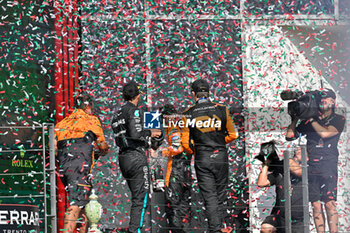 2024-07-21 - #44 Lewis Hamilton Of The Team Mercedes-Amg Petronas Formula One Team, Mercedes W15 And #81 Oscar Piastri And #4 Lando Norris Of The Team Mclaren Formula 1 Team, Mclaren Mercedes MCL38Of ,Celebrating The Final Podium ,During Fia Formula One World Championship F1 Hungarian Grand Prix 2024, 20 July In Budapest, Hungarian - FORMULA 1 HUNGARIAN GRAND PRIX 2024 - RACE - FORMULA 1 - MOTORS