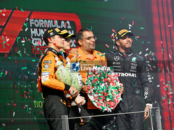 2024-07-21 - #44 Lewis Hamilton Of The Team Mercedes-Amg Petronas Formula One Team, Mercedes W15 And #81 Oscar Piastri And #4 Lando Norris Of The Team Mclaren Formula 1 Team, Mclaren Mercedes MCL38Of ,Celebrating The Final Podium ,During Fia Formula One World Championship F1 Hungarian Grand Prix 2024, 20 July In Budapest, Hungarian - FORMULA 1 HUNGARIAN GRAND PRIX 2024 - RACE - FORMULA 1 - MOTORS