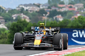 2024-07-20 - #11 Sergio Perez Of The Team Oracle Red Bull Racing, Red Bull Honda RB20 ,They Face Practice Session 3,During Fia Formula One World Championship F1 Hungarian Grand Prix 2024, 20 July In Budapest, Hungarian - FORMULA 1 HUNGARIAN GRAND PRIX 2024 - PRACTICE 3  - FORMULA 1 - MOTORS