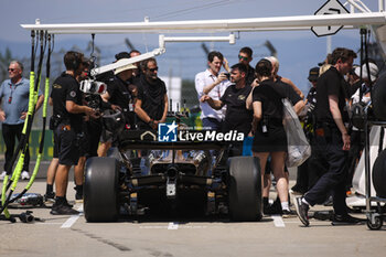 2024-07-18 - APX GP Team crew filming in the paddock for the Apex F1 movie by Apple Studios / Bruckheimer Films during the Formula 1 Hungarian Grand Prix 2024, 13th round of the 2024 Formula One World Championship from July 19 to 21, 2024 on the Hungaroring, in Mogyorod, Hungary - F1 - HUNGARIAN GRAND PRIX 2024 - FORMULA 1 - MOTORS