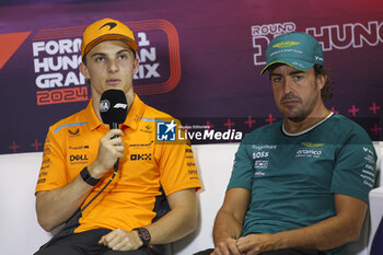 2024-07-18 - PIASTRI Oscar (aus), McLaren F1 Team MCL38, portrait and ALONSO Fernando (spa), Aston Martin F1 Team AMR24, portrait press conference during the Formula 1 Hungarian Grand Prix 2024, 13th round of the 2024 Formula One World Championship from July 19 to 21, 2024 on the Hungaroring, in Mogyorod, Hungary - F1 - HUNGARIAN GRAND PRIX 2024 - FORMULA 1 - MOTORS