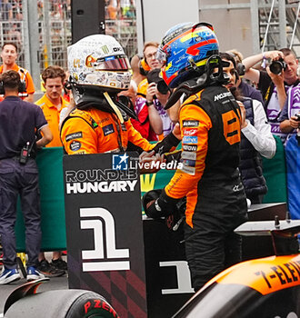 2024-07-20 - (L to R) Lando Norris (GBR) - an Oscar Piastri (AUS) - McLaren Formula 1 Team - McLaren MCL38 - Mercedes
 during Saturday Free Practice and qualify, July 20, of Formula 1 Hungarian Grand Prix 2024, scheduled to take place at Hungaroring track in Mogyorod, Budapest, Hungary, july 19 to july 21, 2024 - FORMULA 1 HUNGARIAN GRAND PRIX 2024 - PRACTICE 3 AND QUALIFYING - FORMULA 1 - MOTORS