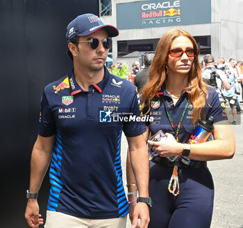 2024-07-21 - Sergio Perez (MEX) - Oracle Red Bull Racing - Red Bull RB20 - Honda RBPT during Raceday on Sunday, July 21, of Formula 1 Hungarian Grand Prix 2024, scheduled to take place at Hungaroring track in Mogyorod, Budapest, Hungary, july 19 to july 21, 2024 - FORMULA 1 HUNGARIAN GRAND PRIX 2024 - RACE - FORMULA 1 - MOTORS