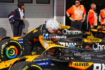 2024-07-21 - Lando Norris (GBR) - cheerin Oscar Piastri (AUS) - McLaren Formula 1 Team - McLaren MCL38 - Mercedes
 for his first win in F1 during Raceday on Sunday, July 21, of Formula 1 Hungarian Grand Prix 2024, scheduled to take place at Hungaroring track in Mogyorod, Budapest, Hungary, july 19 to july 21, 2024 - FORMULA 1 HUNGARIAN GRAND PRIX 2024 - RACE - FORMULA 1 - MOTORS