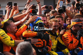 2024-07-21 - Oscar Piastri (AUS) - McLaren Formula 1 Team - McLaren MCL38 - Mercedes
 celebrating his first win in F1

 during Raceday on Sunday, July 21, of Formula 1 Hungarian Grand Prix 2024, scheduled to take place at Hungaroring track in Mogyorod, Budapest, Hungary, july 19 to july 21, 2024 - FORMULA 1 HUNGARIAN GRAND PRIX 2024 - RACE - FORMULA 1 - MOTORS