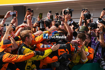 2024-07-21 - Oscar Piastri (AUS) - McLaren Formula 1 Team - McLaren MCL38 - Mercedes
 celebrating his first win in F1

 during Raceday on Sunday, July 21, of Formula 1 Hungarian Grand Prix 2024, scheduled to take place at Hungaroring track in Mogyorod, Budapest, Hungary, july 19 to july 21, 2024 - FORMULA 1 HUNGARIAN GRAND PRIX 2024 - RACE - FORMULA 1 - MOTORS