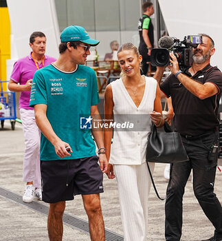 2024-07-21 - Lance Stroll (CAN) - Aston Martin Aramco F1 Team - Aston Martin AMR24 - Mercedes and his girlfriend Sara Pagliaroli (ITA) Model, during Raceday on Sunday, July 21, of Formula 1 Hungarian Grand Prix 2024, scheduled to take place at Hungaroring track in Mogyorod, Budapest, Hungary, july 19 to july 21, 2024 - FORMULA 1 HUNGARIAN GRAND PRIX 2024 - RACE - FORMULA 1 - MOTORS