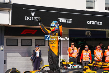 2024-07-21 - Oscar Piastri (AUS) - McLaren Formula 1 Team - McLaren MCL38 - Mercedes
 celebrating his first win in F1

 during Raceday on Sunday, July 21, of Formula 1 Hungarian Grand Prix 2024, scheduled to take place at Hungaroring track in Mogyorod, Budapest, Hungary, july 19 to july 21, 2024 - FORMULA 1 HUNGARIAN GRAND PRIX 2024 - RACE - FORMULA 1 - MOTORS