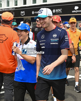 2024-07-21 - Yuki Tsunoda (JPN) - Visa Cash App RB F1 Team - RB VCARB01 - Honda RBPT and Logan Sargeant (USA) - Williams Racing - Williams FW46 - Mercedes during Raceday on Sunday, July 21, of Formula 1 Hungarian Grand Prix 2024, scheduled to take place at Hungaroring track in Mogyorod, Budapest, Hungary, july 19 to july 21, 2024 - FORMULA 1 HUNGARIAN GRAND PRIX 2024 - RACE - FORMULA 1 - MOTORS