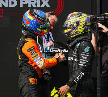 2024-07-21 - Oscar Piastri (AUS) - McLaren Formula 1 Team - McLaren MCL38 - Mercedes
 an Lewis Hamilton (GBR) - Mercedes-AMG PETRONAS F1 Team - Mercedes W15 - Mercedes E Performance during Raceday on Sunday, July 21, of Formula 1 Hungarian Grand Prix 2024, scheduled to take place at Hungaroring track in Mogyorod, Budapest, Hungary, july 19 to july 21, 2024 - FORMULA 1 HUNGARIAN GRAND PRIX 2024 - RACE - FORMULA 1 - MOTORS