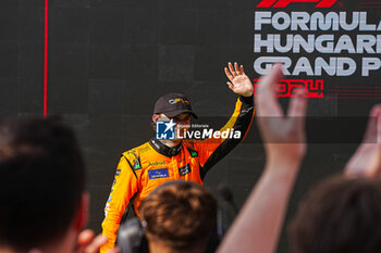 2024-07-21 - Oscar Piastri (AUS) - McLaren Formula 1 Team - McLaren MCL38 - Mercedes
 celebrating his first win in F1

 during Raceday on Sunday, July 21, of Formula 1 Hungarian Grand Prix 2024, scheduled to take place at Hungaroring track in Mogyorod, Budapest, Hungary, july 19 to july 21, 2024 - FORMULA 1 HUNGARIAN GRAND PRIX 2024 - RACE - FORMULA 1 - MOTORS