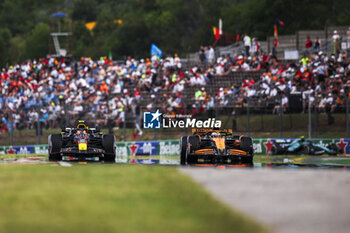 2024-07-20 - 04 NORRIS Lando (gbr), McLaren F1 Team MCL38, 11 PEREZ Sergio (mex), Red Bull Racing RB20, action during the Formula 1 Hungarian Grand Prix 2024, 13th round of the 2024 Formula One World Championship from July 19 to 21, 2024 on the Hungaroring, in Mogyorod, Hungary - F1 - HUNGARIAN GRAND PRIX 2024 - FORMULA 1 - MOTORS