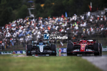 2024-07-20 - 16 LECLERC Charles (mco), Scuderia Ferrari SF-24, 63 RUSSELL George (gbr), Mercedes AMG F1 Team W15, action during the Formula 1 Hungarian Grand Prix 2024, 13th round of the 2024 Formula One World Championship from July 19 to 21, 2024 on the Hungaroring, in Mogyorod, Hungary - F1 - HUNGARIAN GRAND PRIX 2024 - FORMULA 1 - MOTORS