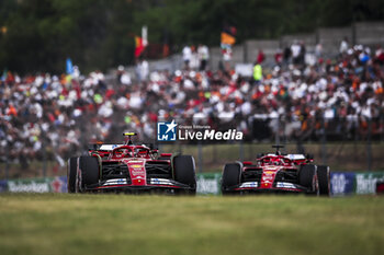 2024-07-20 - 55 SAINZ Carlos (spa), Scuderia Ferrari SF-24, 16 LECLERC Charles (mco), Scuderia Ferrari SF-24, action during the Formula 1 Hungarian Grand Prix 2024, 13th round of the 2024 Formula One World Championship from July 19 to 21, 2024 on the Hungaroring, in Mogyorod, Hungary - F1 - HUNGARIAN GRAND PRIX 2024 - FORMULA 1 - MOTORS