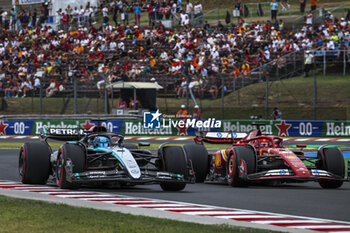 2024-07-20 - 63 RUSSELL George (gbr), Mercedes AMG F1 Team W15, 16 LECLERC Charles (mco), Scuderia Ferrari SF-24, action during the Formula 1 Hungarian Grand Prix 2024, 13th round of the 2024 Formula One World Championship from July 19 to 21, 2024 on the Hungaroring, in Mogyorod, Hungary - F1 - HUNGARIAN GRAND PRIX 2024 - FORMULA 1 - MOTORS