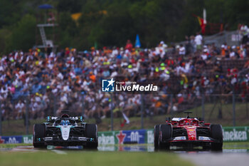 2024-07-20 - 63 RUSSELL George (gbr), Mercedes AMG F1 Team W15, action and 16 LECLERC Charles (mco), Scuderia Ferrari SF-24, action during the Formula 1 Hungarian Grand Prix 2024, 13th round of the 2024 Formula One World Championship from July 19 to 21, 2024 on the Hungaroring, in Mogyorod, Hungary - F1 - HUNGARIAN GRAND PRIX 2024 - FORMULA 1 - MOTORS