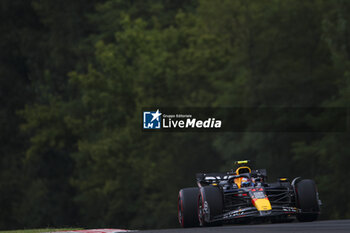 2024-07-20 - 11 PEREZ Sergio (mex), Red Bull Racing RB20, action during the Formula 1 Hungarian Grand Prix 2024, 13th round of the 2024 Formula One World Championship from July 19 to 21, 2024 on the Hungaroring, in Mogyorod, Hungary - F1 - HUNGARIAN GRAND PRIX 2024 - FORMULA 1 - MOTORS