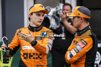 2024-07-20 - PIASTRI Oscar (aus), McLaren F1 Team MCL38, portrait and NORRIS Lando (gbr), McLaren F1 Team MCL38, portrait during the Formula 1 Hungarian Grand Prix 2024, 13th round of the 2024 Formula One World Championship from July 19 to 21, 2024 on the Hungaroring, in Mogyorod, Hungary - F1 - HUNGARIAN GRAND PRIX 2024 - FORMULA 1 - MOTORS