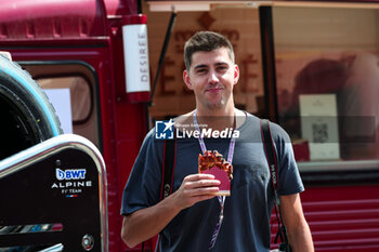 2024-07-25 - Hungry photographer Joao Filipe eating a waffle in the paddock during the Formula 1 Rolex Belgian Grand Prix 2024, 14th round of the 2024 Formula One World Championship from July 26 to 28, 2024 on the Circuit de Spa-Francorchamps, in Stavelot, Belgium - F1 - BELGIAN GRAND PRIX 2024 - FORMULA 1 - MOTORS