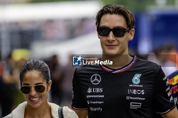 2024-07-25 - FORMULA 1 Hungarian Grand Prix 2024 RACE 19-21 luglio 2024 -George Russell e Carmen Montero Mundt - OUTFITS PILOT - FORMULA 1 - FORMULA 1 - MOTORS