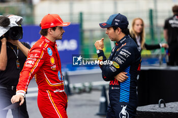 2024-07-27 - PEREZ Sergio (mex), Red Bull Racing RB20, portrait LECLERC Charles (mco), Scuderia Ferrari SF-24, portrait during the Formula 1 Rolex Belgian Grand Prix 2024, 14th round of the 2024 Formula One World Championship from July 26 to 28, 2024 on the Circuit de Spa-Francorchamps, in Stavelot, Belgium - F1 - BELGIAN GRAND PRIX 2024 - FORMULA 1 - MOTORS